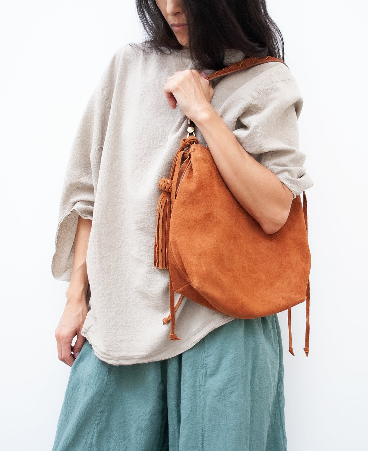 Chavela Studded Tote Bag with fringes: Vibrant Apricot Genuine Suede