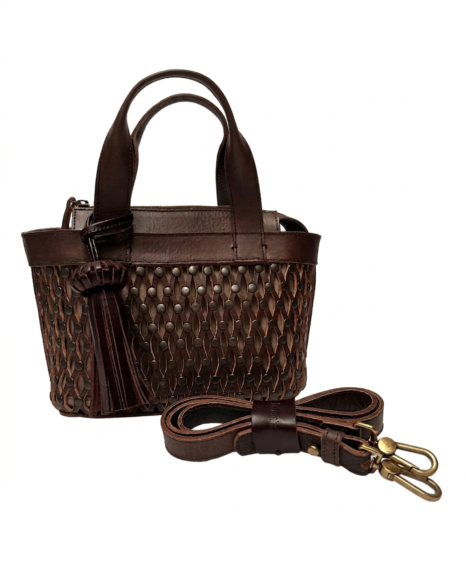 Mini Tulum dark brown leather bag with removable crossbody strap attached.