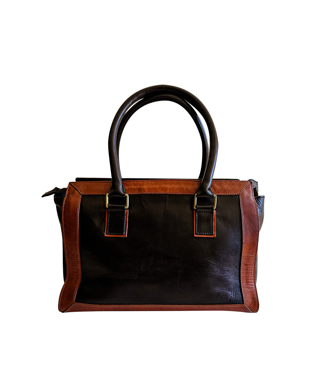 Second Chance Pre-Loved B/W Cowhide Brown Leather Bag: The lifecycle of our Bixi bags