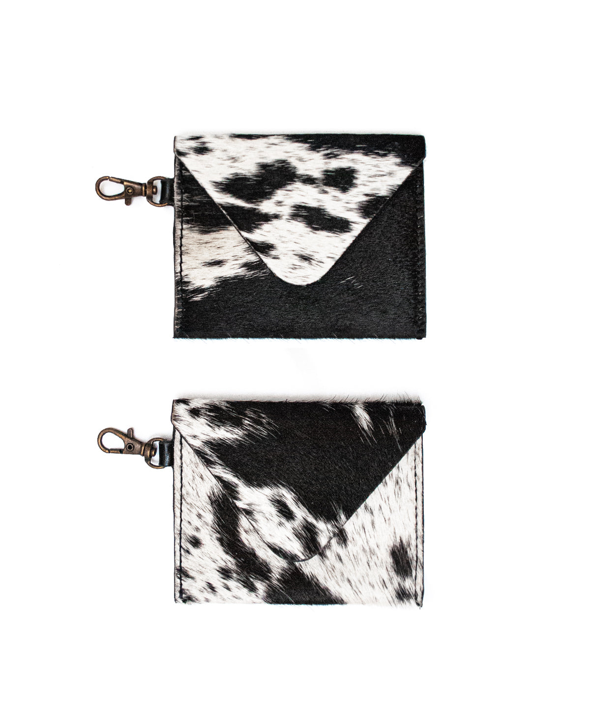 Slim wallet with cowhide fur being carried in a front pocket for minimal bulk.	

Billetera delgada de pelo de vaca en el bolsillo frontal, sin volumen.